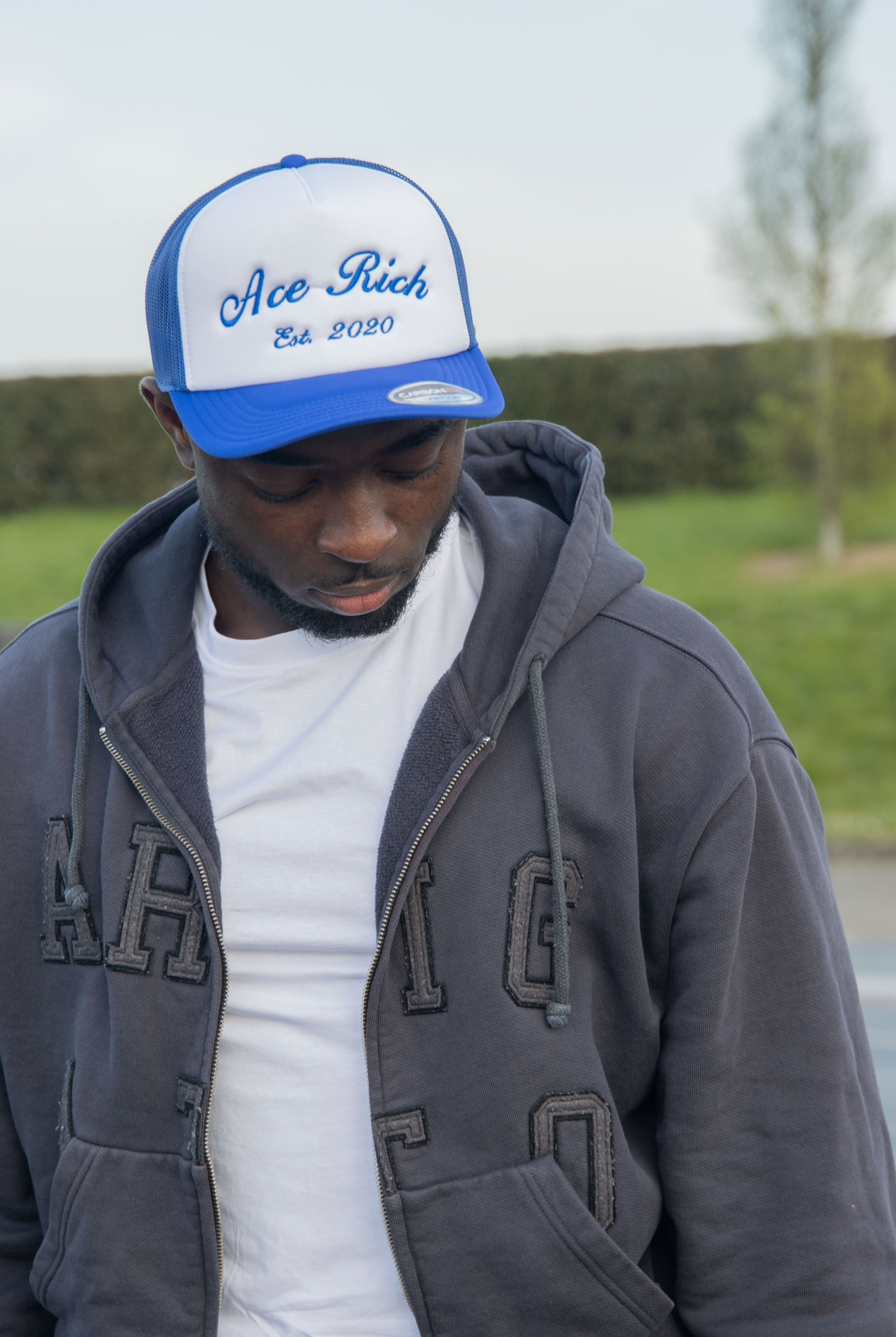 BLUE AND WHITE ACE RICH TRUCKER